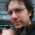 Portrait of Joachim Noreiko, a team member of Factorial.