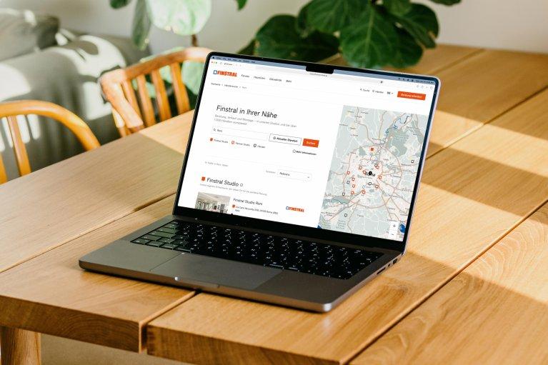 Mockup of the Finstral Website on a desktop screen.
