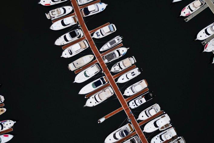 Aerial view of boats in a marina, symbolizing connected systems in an open source CRM.
