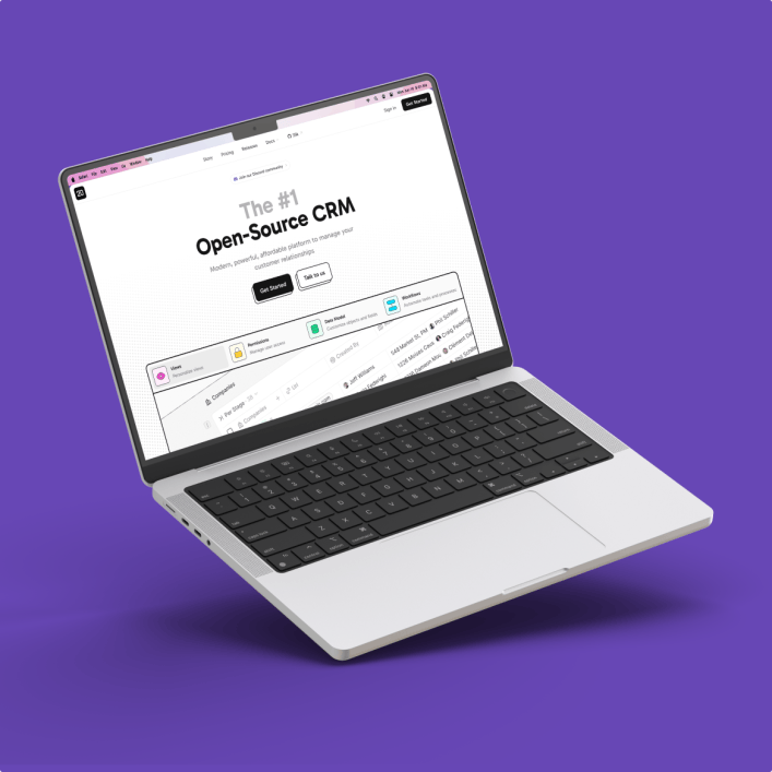 A floating laptop against a purple background displays a CRM website as part of JOCI's services.